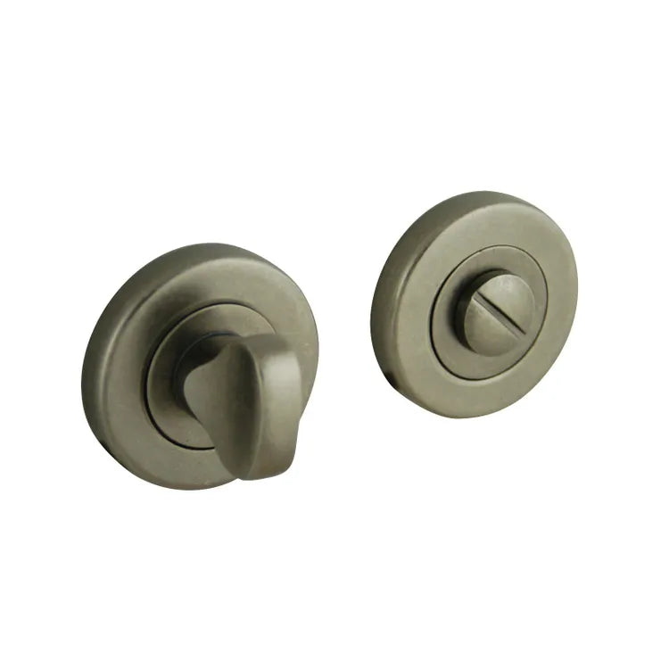 2 rosaces de fonction E2 CHRISLIGNE, acier patiné condamnation et décondamnation